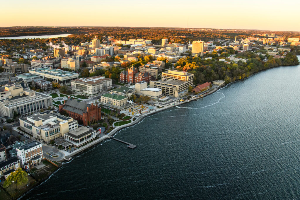 Lake Mendota and the University of Wisconsin Madison campus in the early morning, as seen from a helicoptor